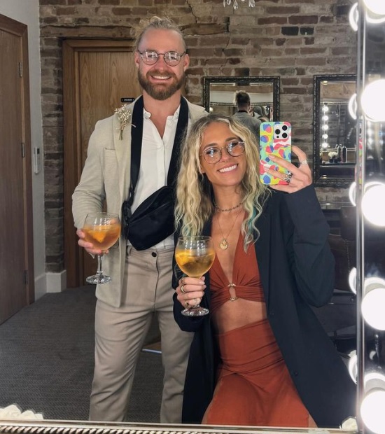 WWE Wrestler Sol Ruca posing with her boyfriend Tyler Bate 