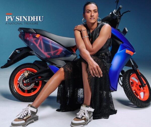 PV Sindhu on Man's World India May 2024 in a black lace dress and sneakers