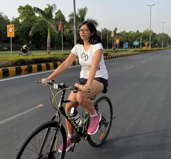 Swati Maliwal riding a bike wearing short clothes 