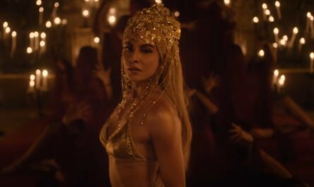 Jacqueline Fernandez in Stormrider wearing a Golden Bikini