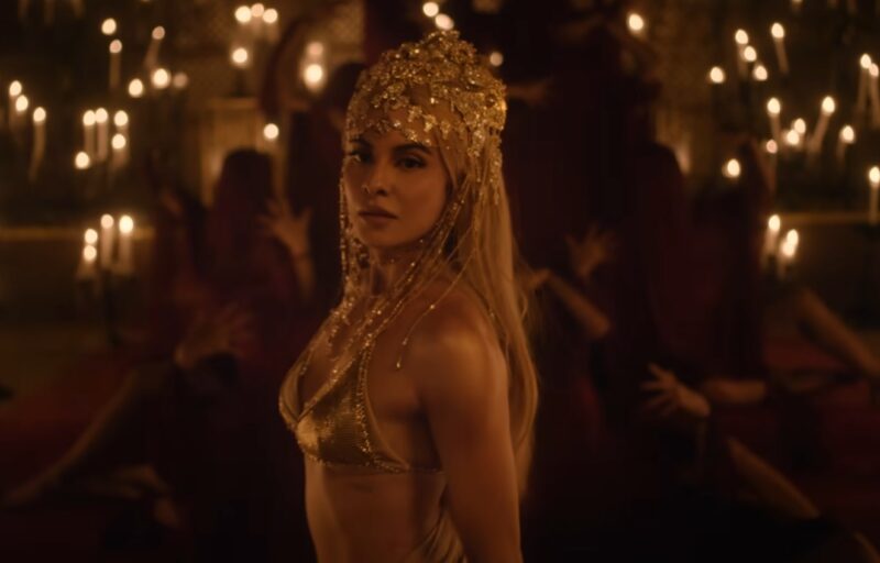 Jacqueline Fernandez in Stormrider wearing a Golden Bikini