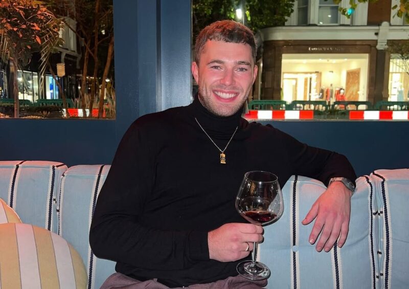 Love Island: All Stars Season 2 Curtis Pritchard enjoying wine