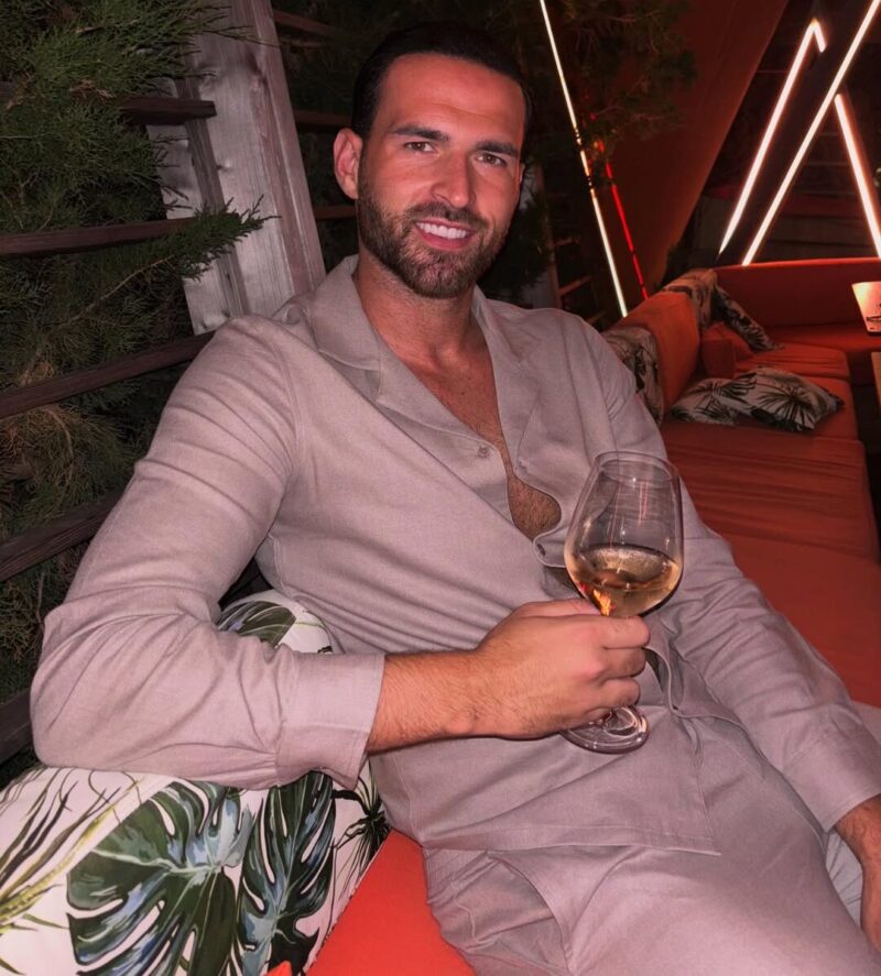 Love Island: All Stars Season 2 Ronnie Vint enjoying wine