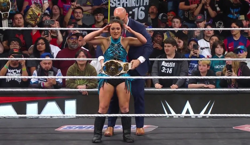 Adam Pearce putting Intercontinental Championship belt around Lyra Valkyria waist on WWE RAW 13 Jan 2025 