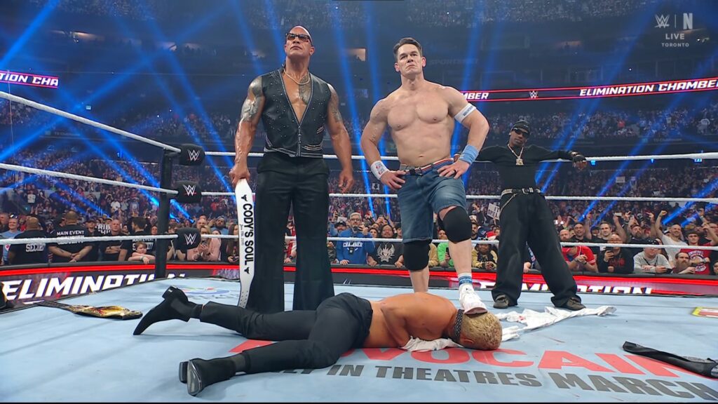 WWE Elimination Chamber 2025 John Cena turned Corporate Heel standing alongside The Rock and Travis Scott