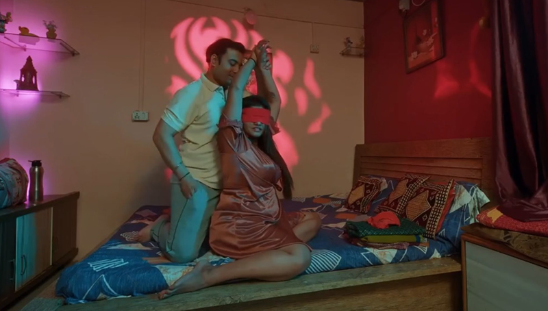 Shatir ULLU Web Series Bharti Jha blindfolded making out with her husband Ajay on bed