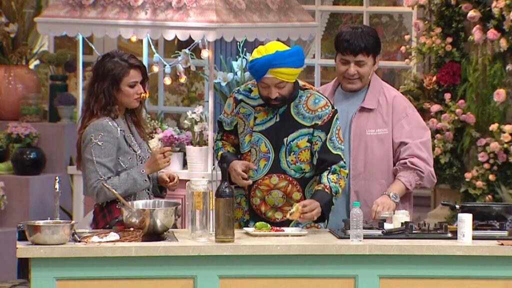 Chef Harpal Singh Sokhi judging the Paneer Shawarma Pockets made by Nia Sharma in Laughter Chefs Season 2 Episode 46