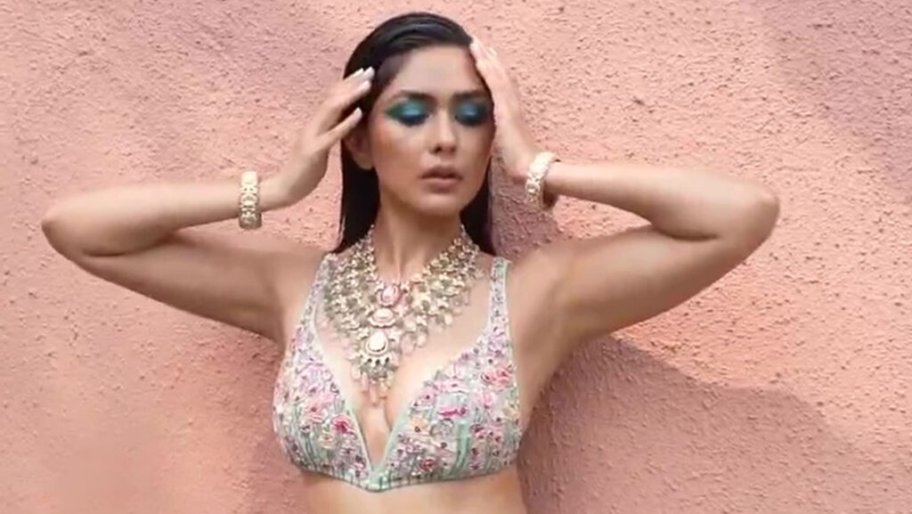 Indian actress Mrunal Thakur flaunting her shaved armpits while posing for First Look Magazine April-June 2023 Edition Photoshoot