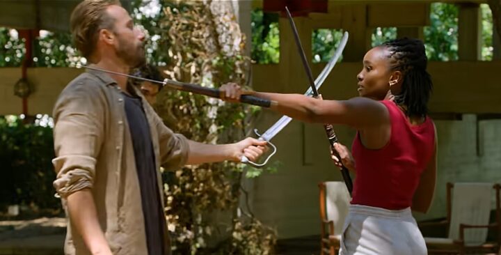 Nile beating Booker in a Sword Fight in The Old Guard 2 (2025) film