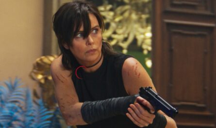 Charlize Theron as Andy shooting with a gun in The Old Guard 2 (2025 Netflix Film)