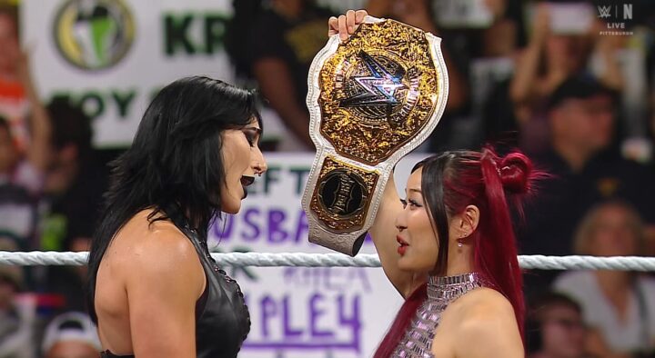IYO SKY showing off her title to Rhea Ripley on WWE RAW 30 June 2025