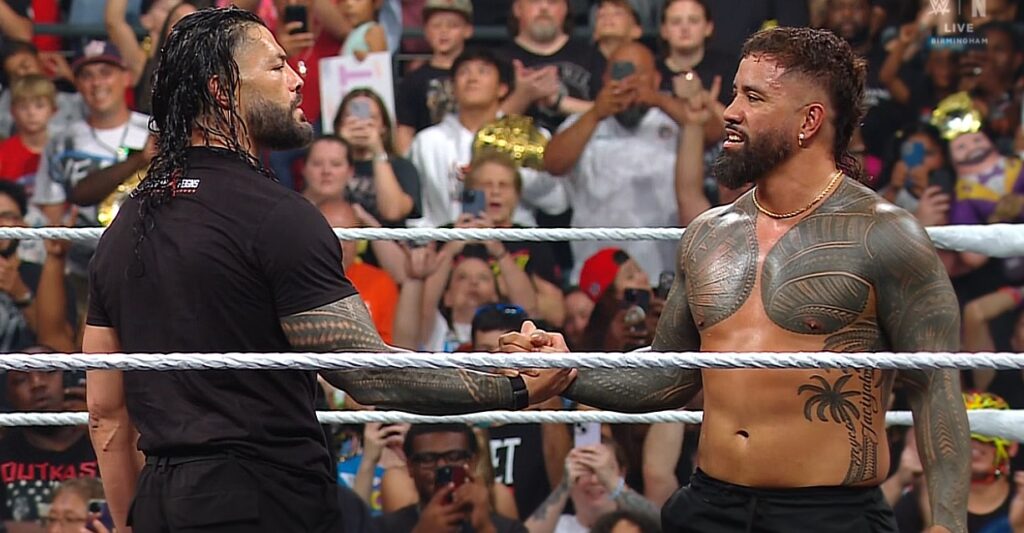 Roman Reigns shaking hand with his brother Jey Uso on WWE RAW 14 July 2025 show