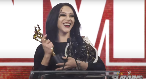 Female Pro Wrestler Stephanie Vaquer giving speech on stage after winning Slammy Award for Breakout Superstar of the Year 2025