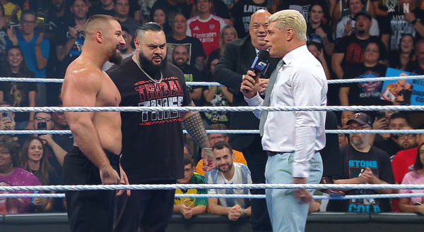 WWE SmackDown 26 September 2025 Cody Rhodes in ring with Bron Breakker, Bronson Reed, and Paul Heyman