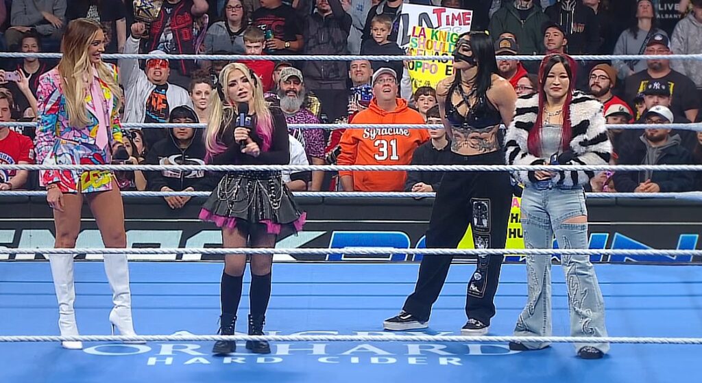 WWE SmackDown 14 November 2025 Episode Charlotte Flair, Alexa Bliss, Rhea Ripley, and IYO SKY together inside the ring.