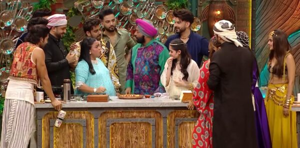 Chef Harpal Singh Sokhi tasting on Jannat Zubair and Aly Goni cooking station on Laughter Chefs Season 3 Episode 6